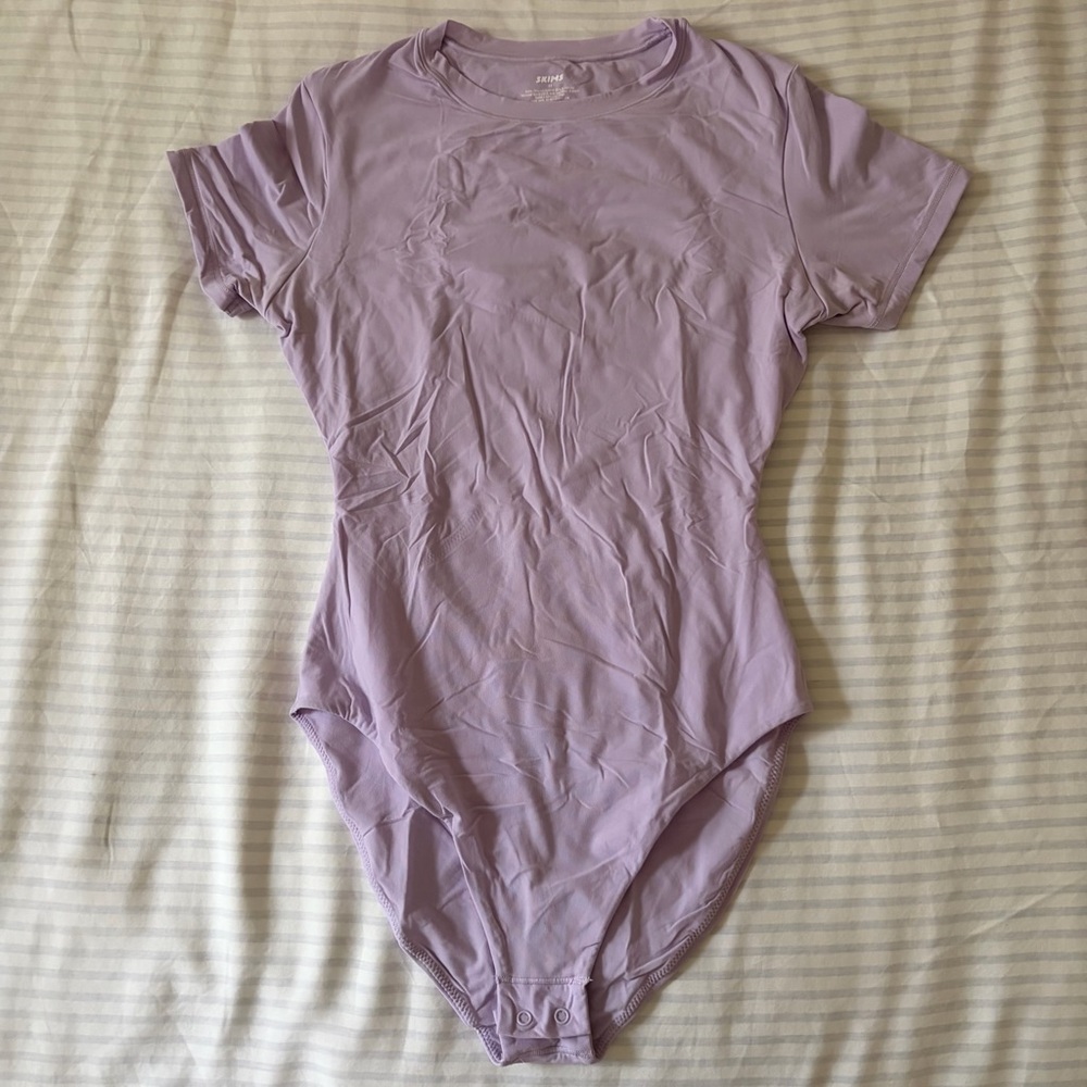 SKIMS Fits Everybody T-Shirt Bodysuit in Lily (Limited Edition Color)